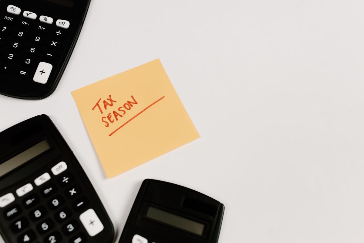 Calculators and paperwork representing the admin founders face without proper formation help